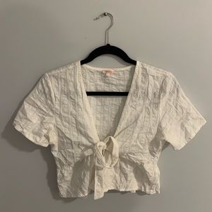 White flounce tie top